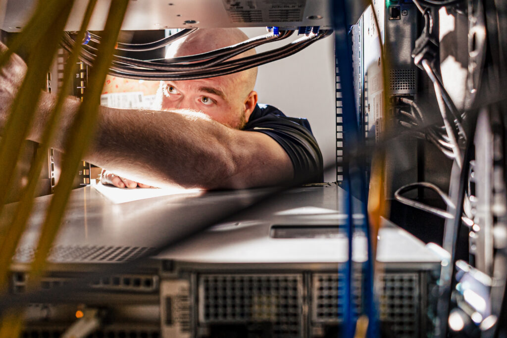 Man installing Dell devices