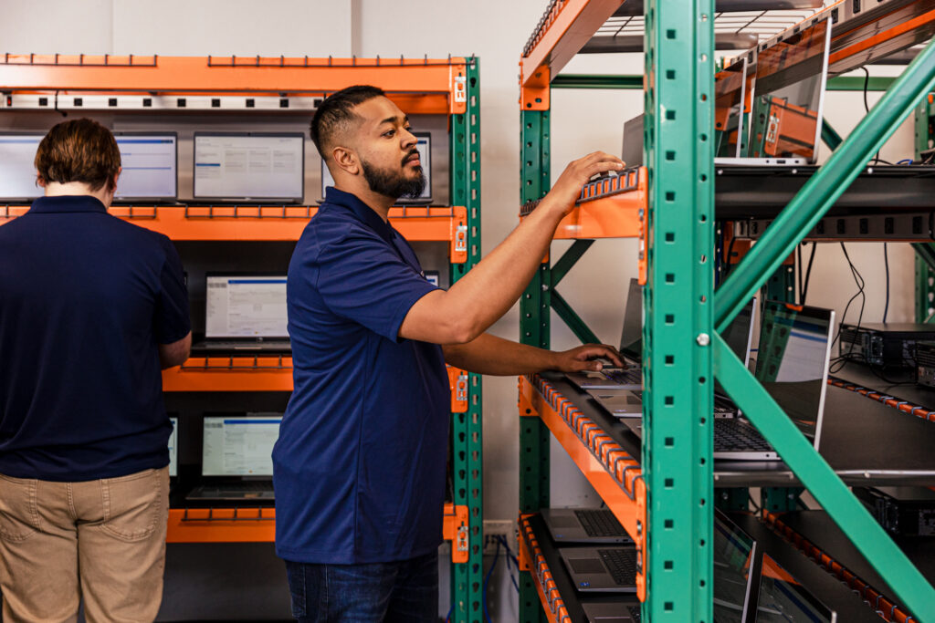 Engineer working on a client device refresh